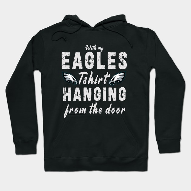 With My Eagles Tshirt Hanging From The Door Hoodie by Ksarter